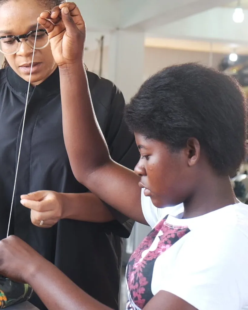 Practical instruction in the African Fashion Foundation’s Kayayei programme